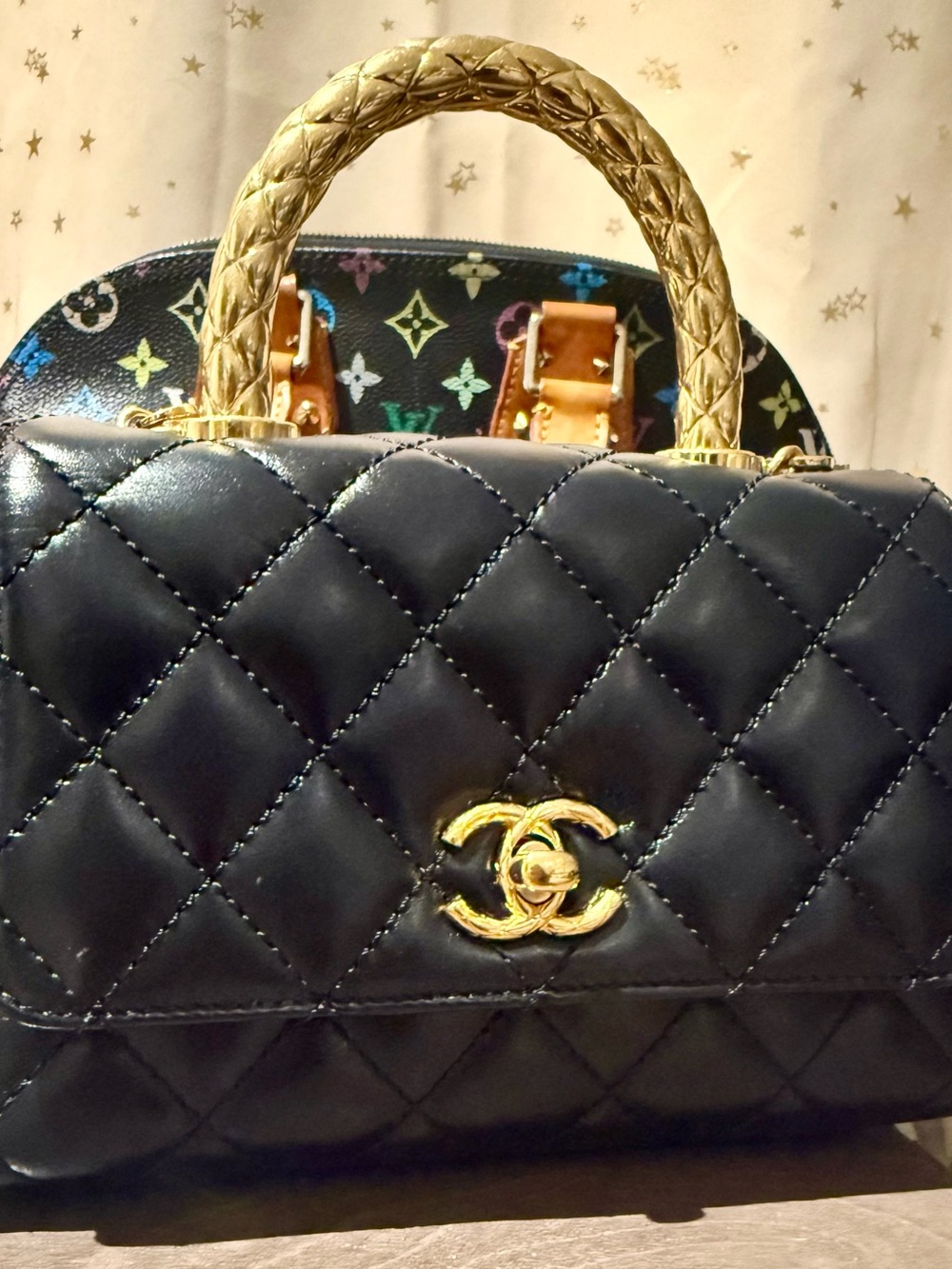 CHANEL Black Quilted Mini Top-Handle Bag with Gold Hardware